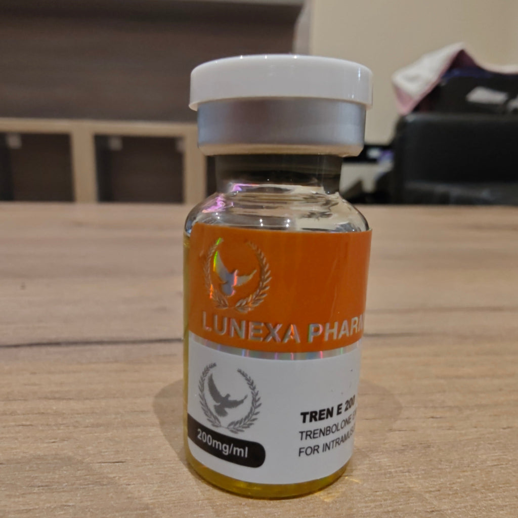 Vial labeled 'Lunexa Pharma' on a wooden surface