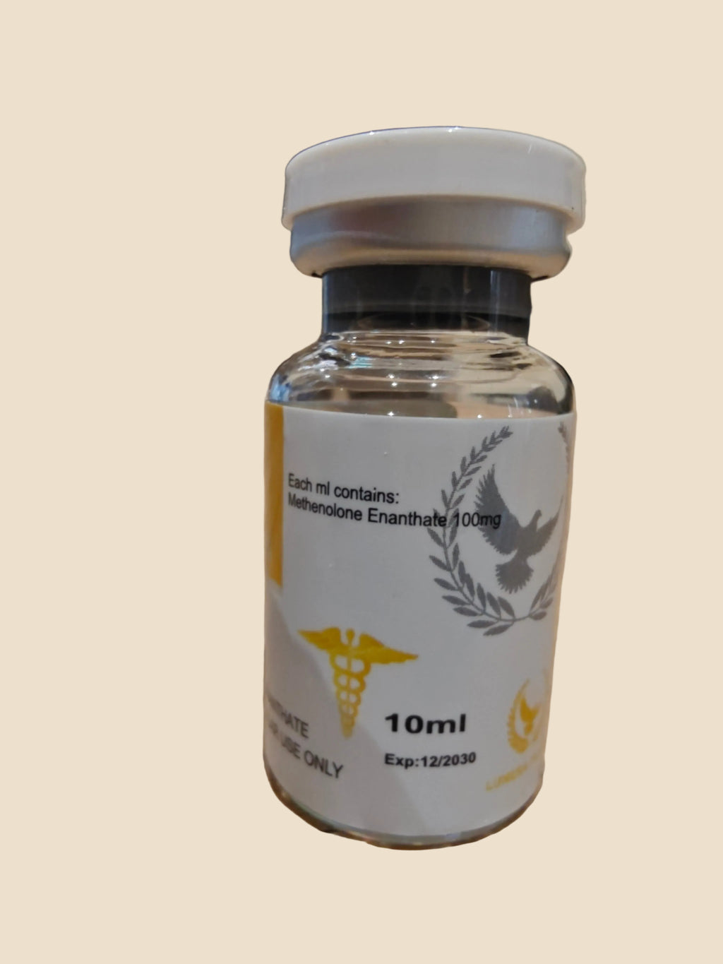 Vial with a label on a wooden surface